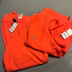 NWT limited edition firey coral scrub set